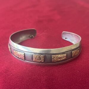 Navajo style Solid silver with gold accents cuff bracelet. Size small
